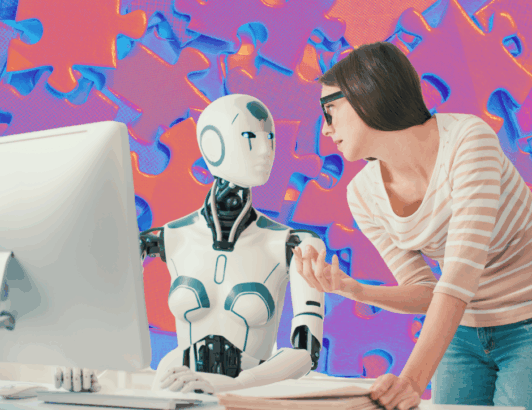 Woman collaborating with humanoid robot at computer against colourful puzzle background.
